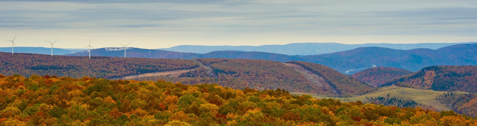 rolling mountains and wind turbines